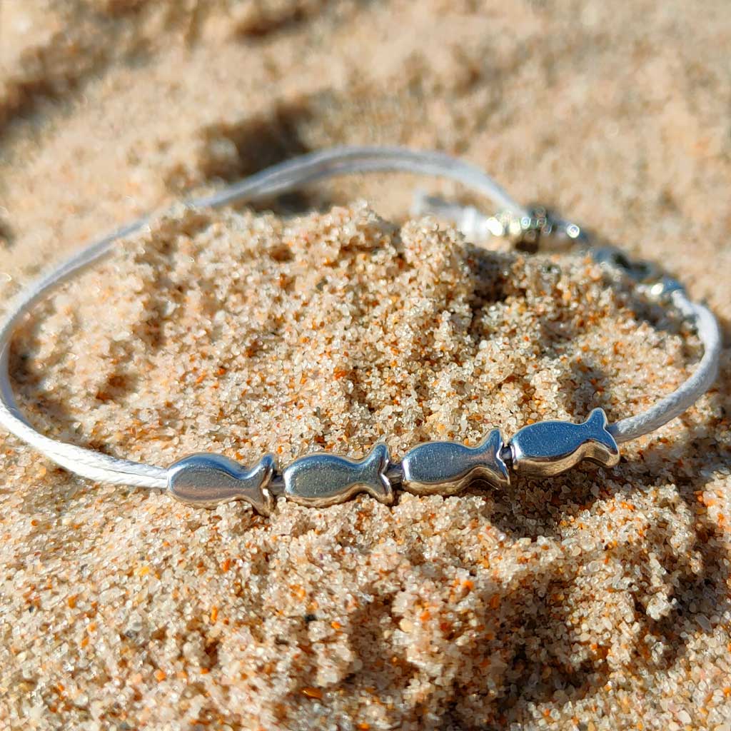 Pulsera de peces regulable
