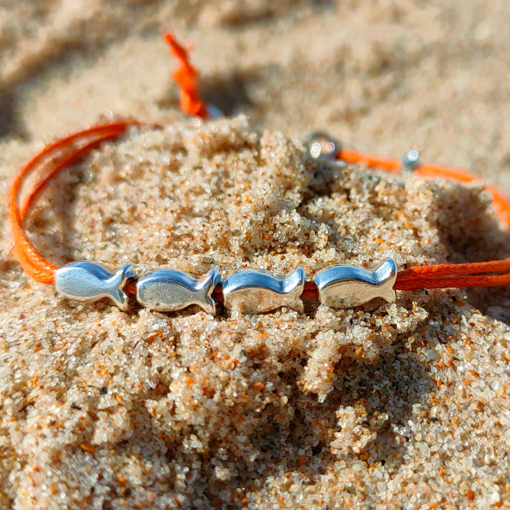 Pulsera de peces regulable